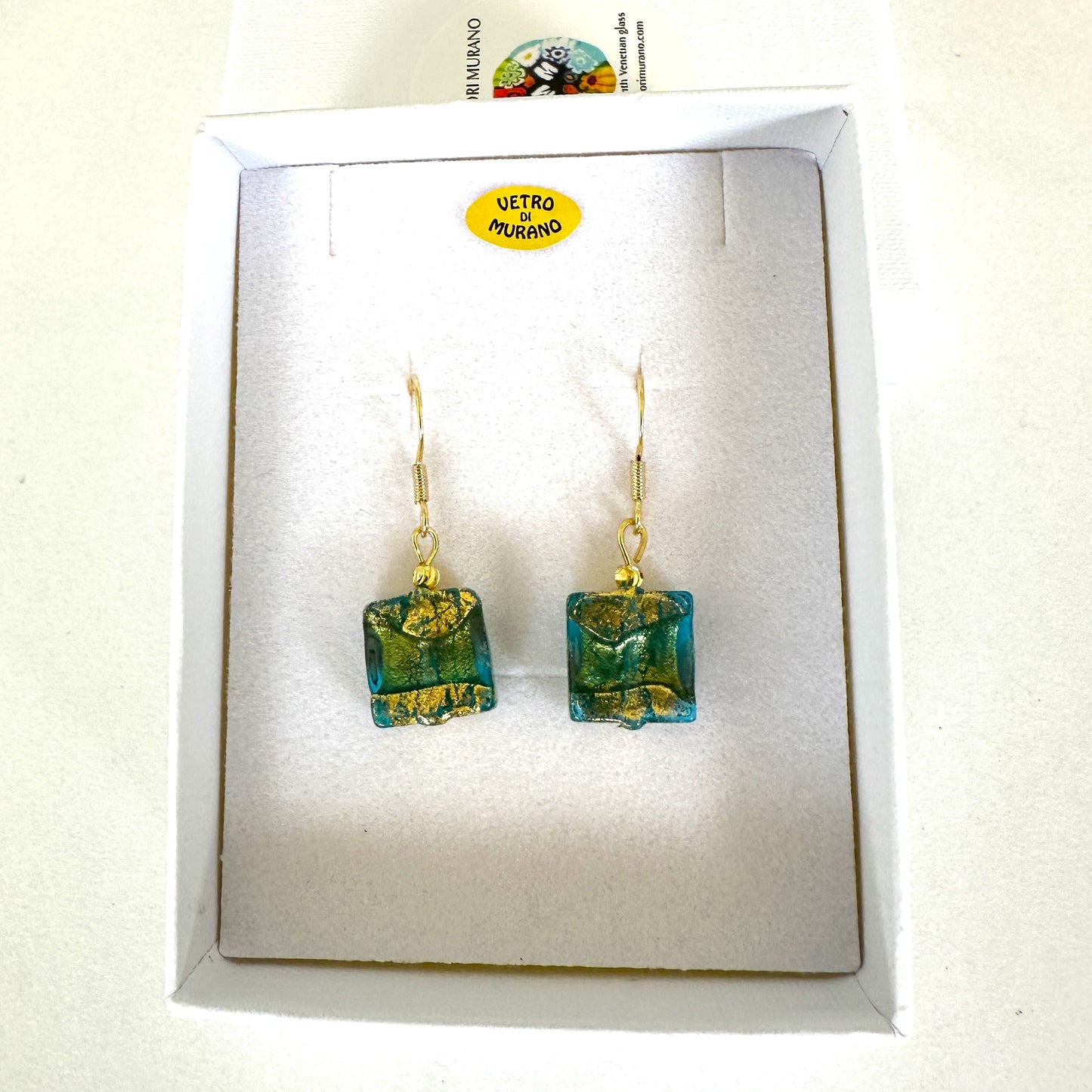 Sole gold earrings